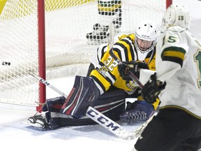 London Knights forward Cole Tymkin score the teams seventh goal of the game against  Sarnia Sting goalie Cameron Lamour during their OHL game in London. Derek Ruttan/The London Free Press/Postmedia Network