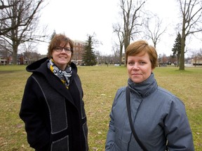 Kate Rapson, chair of the Woodfield Community Association, and Shawna Lewkowitz, president of the Urban League, want Londoners to speak up about the kind of development they could tolerate around Victoria Park.  (Mike Hensen/The London Free Press)