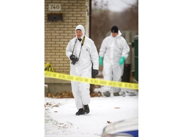 London police search the scene of London's first homicide of the year, a stabbing at 740 Notre Dame Drive Sunday evening. Photograph taken on Monday January 7, 2019.  (MIKE HENSEN, The London Free Press)