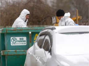 London police search a construction bin at the scene of London's first homicide of 2019, a stabbing at 740 Notre Dame Dr. that killed Nicholas Baltzis. Photograph taken on Monday January 7, 2019. (MIKE HENSEN, The London Free Press)