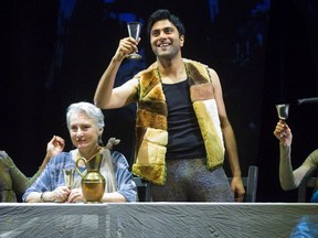 Odysseus, played by Praneet Akilla, offers a toast to his wife Penelope, played by Seana McKenna, left, in the Grand Theatre’s production of The Penelopiad by Margaret Atwood Wednesday. (MIKE HENSEN, The London Free Press)