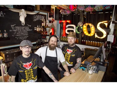 Chef Geoff Haynes and co-owners Justin Wolfe (middle) and Gregg Wolfe at Rock Au Taco in London, Ont. on Thursday March 6, 2014. (DEREK RUTTAN/The London Free Press)