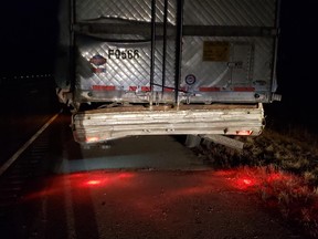 A Brampton man faces charges after a transport truck that was damaged in a Michigan crash was pulled over in Southwestern Ontario. (OPP supplied photo)