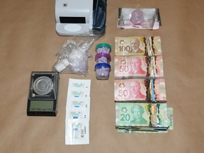 Three Londoners are facing charges after a search warrant was executed on Millbank Drive on January 24, 2019. (Police handout)