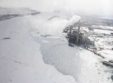 Canadian Coast Guard icebreakers rely on helicopters to see the extent of ice cover in the St. Clair River. The ice thickens around the St. Clair Power Plant in East China Township, Mich. Tyler Kula/Sarnia Observer/Postmedia Network