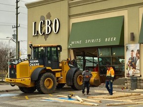 Crews repair damage to an east London LCBO store after a smash-and-grab theft early New Years Day.