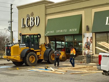 Crews repair damage to an east London LCBO store after a smash-and-grab theft early New Years Day.