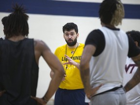 London Lightning head coach Elliott Etherington speaks to players during practice in London. (Derek Ruttan/The London Free Press)