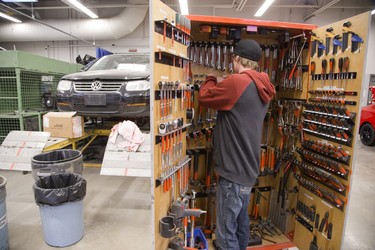 Student Ryan Coulson searches for the right tool at the Autobody and Collision Damage Repair program of Fanshawe College in London, Ont. on Tuesday January 8, 2019. Derek Ruttan/The London Free Press/Postmedia Network