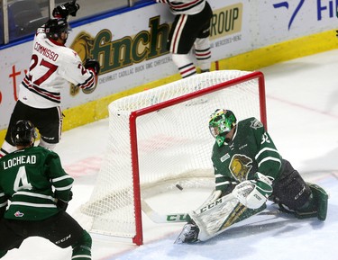 Joseph Raaymakers, of the London Knights, can't get across quickly enough as Guelph Storm's Dominico Commisso converts a pass from Cedric Ralph for the first goal of the game during their Tuesday night game at Budweiser Gardens.  Mike Hensen/The London Free Press