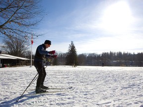 Dennis Koopman of London heads out for a cross-country outing at the Thames Valley Golf Course in London, Ont. Several skiers were out enjoying the thin carpet of snow and bright sunshine which made the weather seem milder than the -5 degrees that the thermometer indicated.  Mike Hensen/The London Free Press/Postmedia Network