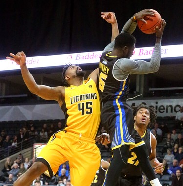 Marvin Phillips of the Lightning comes up empty as he goes up for an offensive rebound against Marvin Binney of the Saint John Riptide during their Sunday afternoon game at Budweiser Gardens in London, Ont. The Lightning fell 107-98 against the Riptide who were 4-12 entering the game.
Photograph taken on Sunday January 13, 2019. 
Mike Hensen/The London Free Press/Postmedia Network