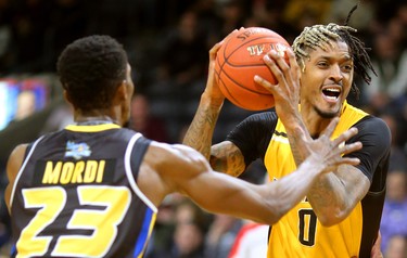 Maurice Bolden of the Lightning picks the ball up on his drive against Jeremiah Mordi of the Saint John Riptide during their Sunday afternoon game at Budweiser Gardens in London, Ont. The Lightning fell 107-98 against the Riptide who were 4-12 entering the game.
Photograph taken on Sunday January 13, 2019. 
Mike Hensen/The London Free Press/Postmedia Network