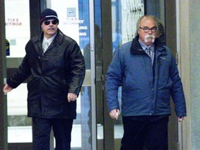 Former employees of Elgin Middlesex Detention Centre, Leslie Lonsbary (left) and Stephen Jurkus leave court following the first day of their trial on charges of failing to provide the necessaries of life in London. (Derek Ruttan/The London Free Press)