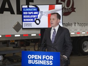 Minister of Transportation Jeff Yurek announces that Ontario will be implementing the Drivewyze PreClear bypass service. Photo shot at The Rosedale Group trucking company in London, Ont. on Thursday January 24, 2019. Derek Ruttan/The London Free Press/Postmedia Network