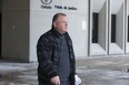 Father Amer Saka leaves court after pleading guilty one count of fraud over $5,000 in London, Ont. on Friday January 25, 2019. Derek Ruttan/The London Free Press/Postmedia Network