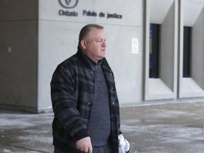 Father Amer Saka leaves court after pleading guilty one count of fraud over $5,000 in London, Ont. on Friday January 25, 2019. Derek Ruttan/The London Free Press/Postmedia Network