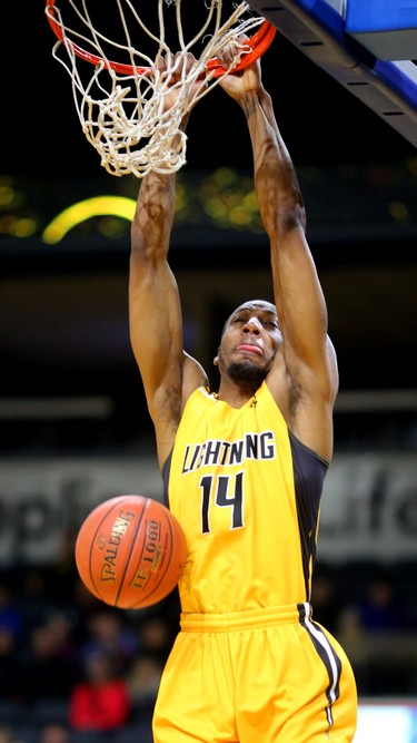 The Lightning's Marcus Capers slams home another alley-oop in the first quarter of their game against the Sudbury 5 at Budweiser Gardens. Photograph taken on Sunday January 27, 2019.  Mike Hensen/The London Free Press/Postmedia Network