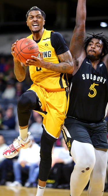 Mo Bolden of Lightning gets fouled by Isiah Johnson of the Sudbury 5, then makes the hoop and the foul shot for a badly needed three points  in the first half of their game against the Sudbury 5 at Budweiser Gardens. Photograph taken on Sunday January 27, 2019.  Mike Hensen/The London Free Press/Postmedia Network