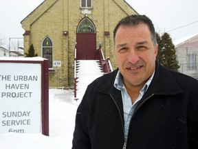 Dan Morand, the senior pastor at Beth Emmanuel church at 340 Grey Street in London, Ont.  Moran, the director of Urban Haven Project in London has opened the church to allow people to sleep in the warmth of the sanctuary rather than on the streets. Mike Hensen/The London Free Press/Postmedia Network