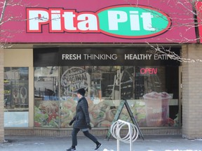 Pita Pit has more than 225 locations in Canada, including this one on Richmond Row in London. The company partnered with WeedMD, a London-area marijuana  producer, to form Pioneer Cannabis Corp. The newly formed company will advise clients looking to open marijuana retailers. DALE CARRUTHERS / THE LONDON FREE PRESS