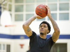 London Lightning basketball player Maurice Bolden works on his free throws during a team practice. (File photo)