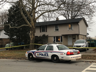 A London police cruiser is seen outside a Notre Dame Drive home in London's southwest end, where police are investigating a fatal Sunday night stabbing. (JONATHAN JUHA, The London Free Press)