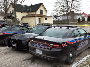 Chatham-Kent police blocked off the intersection of King and Albert Street in Wallaceburg,on Tuesday morning while investigating a shooting at the home at 208 King St. DAVID GOUGH/Postmedia Services