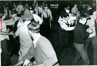 Confrontation between London police and the public at a street party, 1969, (London Free Press files)