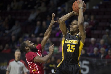 London's Anthony gaines Jr. takes a jump shot over Windsor's Horace Wormely in NBLC action between the Windsor Express and the London Lightning at the WFCU Centre, Wednesday, February 6, 2019.  (DAX MELMER/Windsor Star)