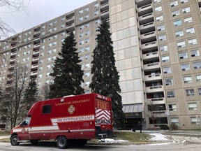 A vehicle from the London Fire Department remains on Monday outside a Proudfoot Lane building where a fire killed one man Sunday night. (JONATHAN JUHA, The London Free Press)