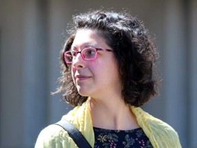Melissa Facciolo leaves the London courthouse. (DALE CARRUTHERS / THE LONDON FREE PRESS)
