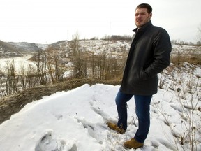 Jonathan Aarts stands overlooking the Byron gravel pit in west London, where he hopes to develop a multi-use neighbourhood in London, Ont. on Monday February 4, 2019. Mike Hensen/The London Free Press/Postmedia Network