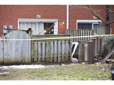 The rear of 67 Arbour Glen Crescent where a man died after being wounded by an arrow in London, Ont. on Tuesday February 5, 2019. (Derek Ruttan/The London Free Press)