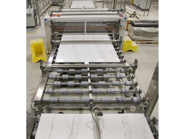 Quartz slabs roll off the line at HanStone Canada’s London factory. (Derek Ruttan, The London Free Press)