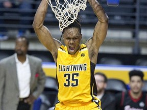 The London Lightning's AJ Gaines slams home two points during their game against the Windsor Express in London, Ont. on Thursday February 7, 2019. Derek Ruttan/The London Free Press/Postmedia Network