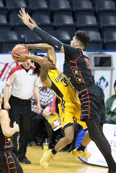 The home crowd rained down a chorus of "boos" after the Windsor Express defender Ty Walker was not called for a foul on the London Lightning's AJ Gaines during their game in London, Ont. on Thursday February 7, 2019. Derek Ruttan/The London Free Press/Postmedia Network