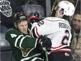 Carter Robertson of the Owen Sound Attack crashes into William Lochead of the London Knights during their OHL game on Friday February 8, 2019 in London. (Derek Ruttan/The London Free Press)