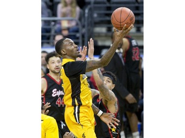 The London Lightning's  Kevin Ware lays up two points in the first half of their NBL game against the Windsor Express at Budweiser Gardens in London, Ont. on Sunday February 10, 2019. Derek Ruttan/The London Free Press/Postmedia Network