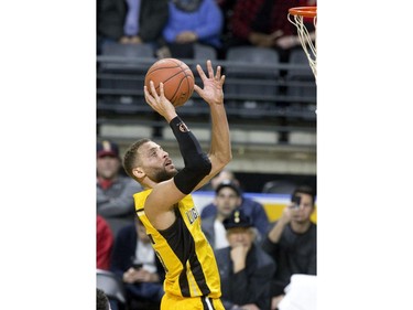 The London Lightning's  Garrett Williamson lays up two points in the first half of their NBL game against the Windsor Express at Budweiser Gardens in London, Ont. on Sunday February 10, 2019. Derek Ruttan/The London Free Press/Postmedia Network