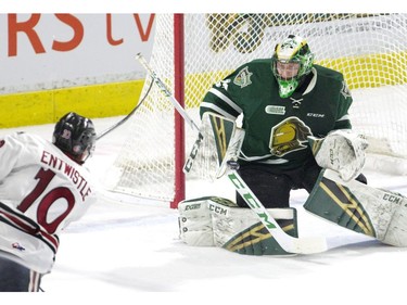 London Knights goalie Joseph Raaymakers stops a shot by MacKenzie Entwistle of the Guelph Storm during the second period of their OHL game at Budweiser Gardens in London on Wednesday Feb. 13, 2019. Derek Ruttan/The London Free Press