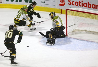 Antonio Stranges as a trailer gets a perfect pass from Paul Cotter and makes no mistake as he finds the empty net behind North Bay goalie Christian Purboo to open the scoring Sunday February 24, 2019 at Budweiser Gardens.  The Knights finally got their offence running with 8 goals so far in the game. Mike Hensen/The London Free Press/Postmedia Network