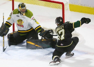 Knights Nathan Dunkley couldn't convert this puck as he puts it into the pads of Battalion goalkeeper Christian Purboo during their afternoon game Sunday February 24, 2019 at Budweiser Gardens.  The Knights finally got their offence running with 8 goals so far in the game. Mike Hensen/The London Free Press/Postmedia Network
