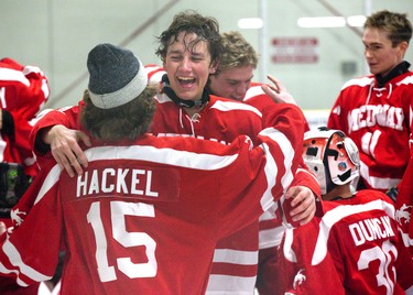 The Medway Cowboys celebrate their championship victory over the Lucas Vikings at Nichols Arena in London, Ont. on Tuesday. The Cowboys won the game 6-1 to win the TVRA AAA Central championship two games to none.Derek Ruttan/The London Free Press/Postmedia Network