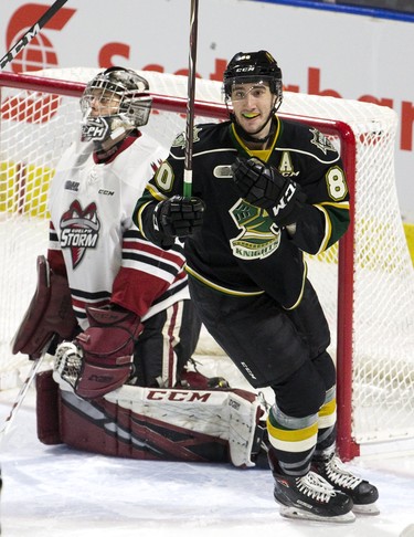 London Knight  Alex Formenton celebrates in front of Guelph Storm goalie Anthony Popovich  after Cole Tymkin put the Knights up 1-0 during the first period of their game in London, Ont. on Tuesday. Derek Ruttan/The London Free Press/Postmedia Network