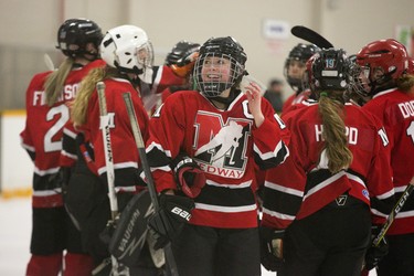 Medway Cowboys captain Jaci Solomon is all smiles as she celebrates with teammates at  Carling Arena in London, Ont. on Wednesday. Medway won their game agains the Lucas Vikings 6-1 to take the series 2-0 and win the TVRA Central hockey championship. Derek Ruttan/The London Free Press/Postmedia Network