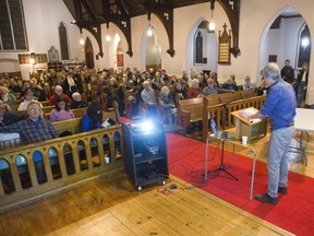 Don Kerr, sociology professor at King's University College, speaks to concerned citizens about poverty in London at St. John the Evangelist Anglican Church in London. Derek Ruttan/The London Free Press