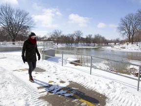 Celine Gravelines, an employee at InfoTech, is happy with their move downtown to their newly renovated old building on Ridout Street, because her lunch breaks now afford her walks along the Thames River at the forks in London, Ont.  Mike Hensen/The London Free Press