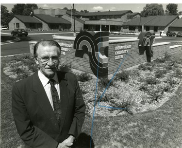 Alan Adlington, former Ontario deputy minister of colleges and universities in front of Merrymount Children's Centre new facilities, 1991. (London Free Press files)