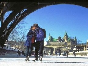Skaters share a kiss on the Rideau Canal Skateway during Winterlude in Ottawa.